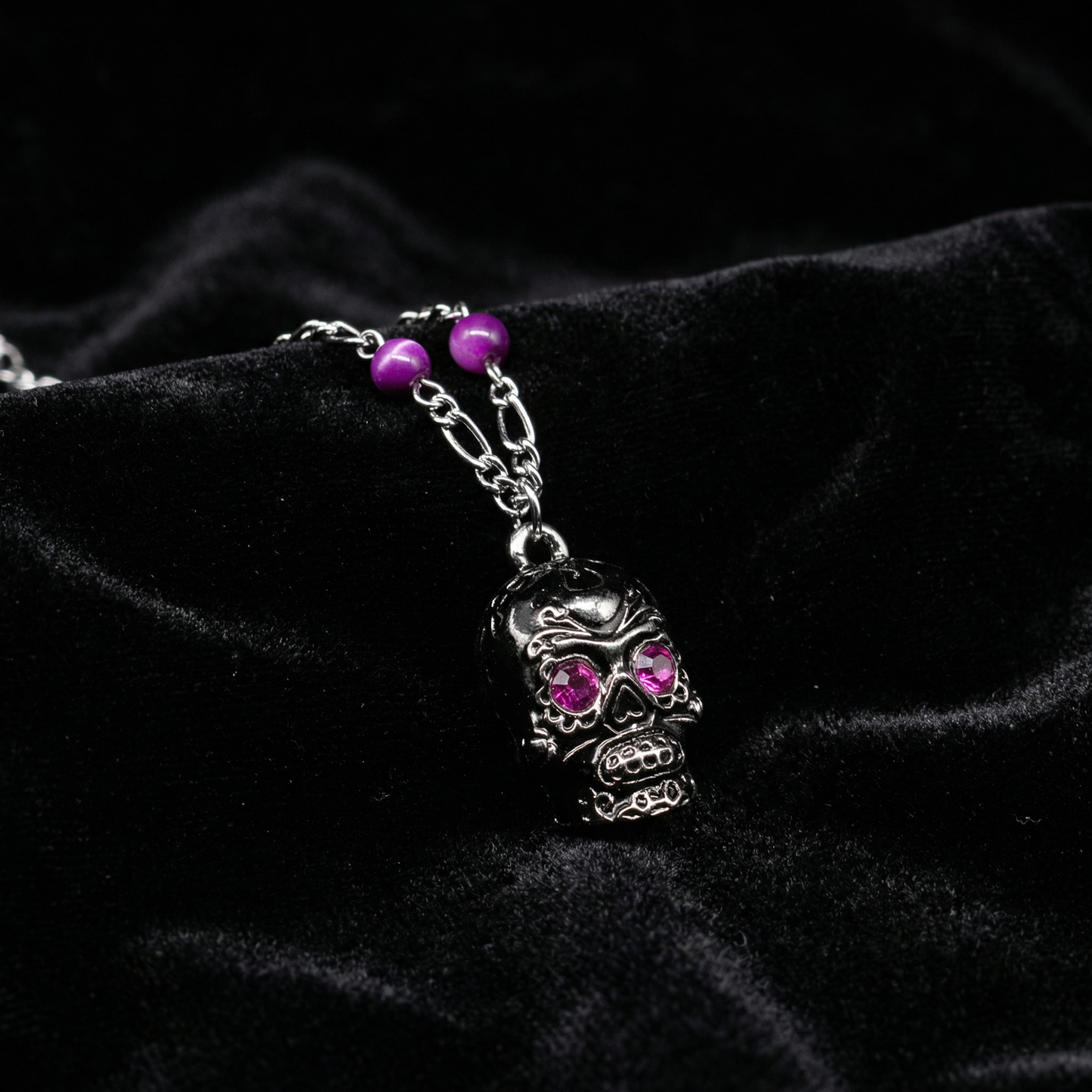 Sourpuss Silver Skull Pendant Necklace | Sugar Skull with Rhinestone Eyes – Clear & Purple Options